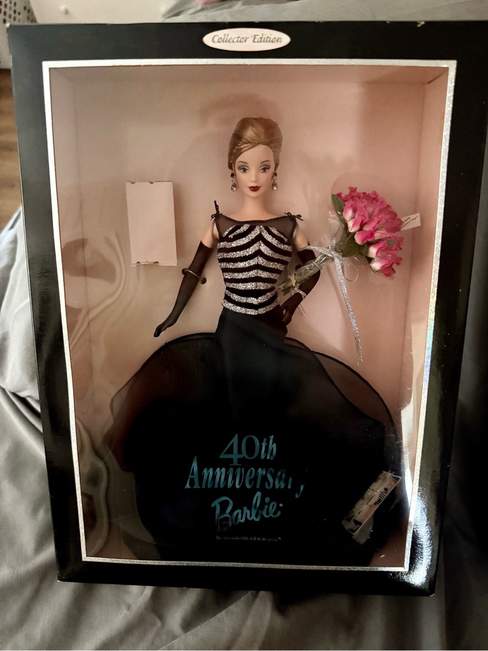 Collector Edition 40th Anniversary Barbie in Black Gown with Pink Bouquet (1999)